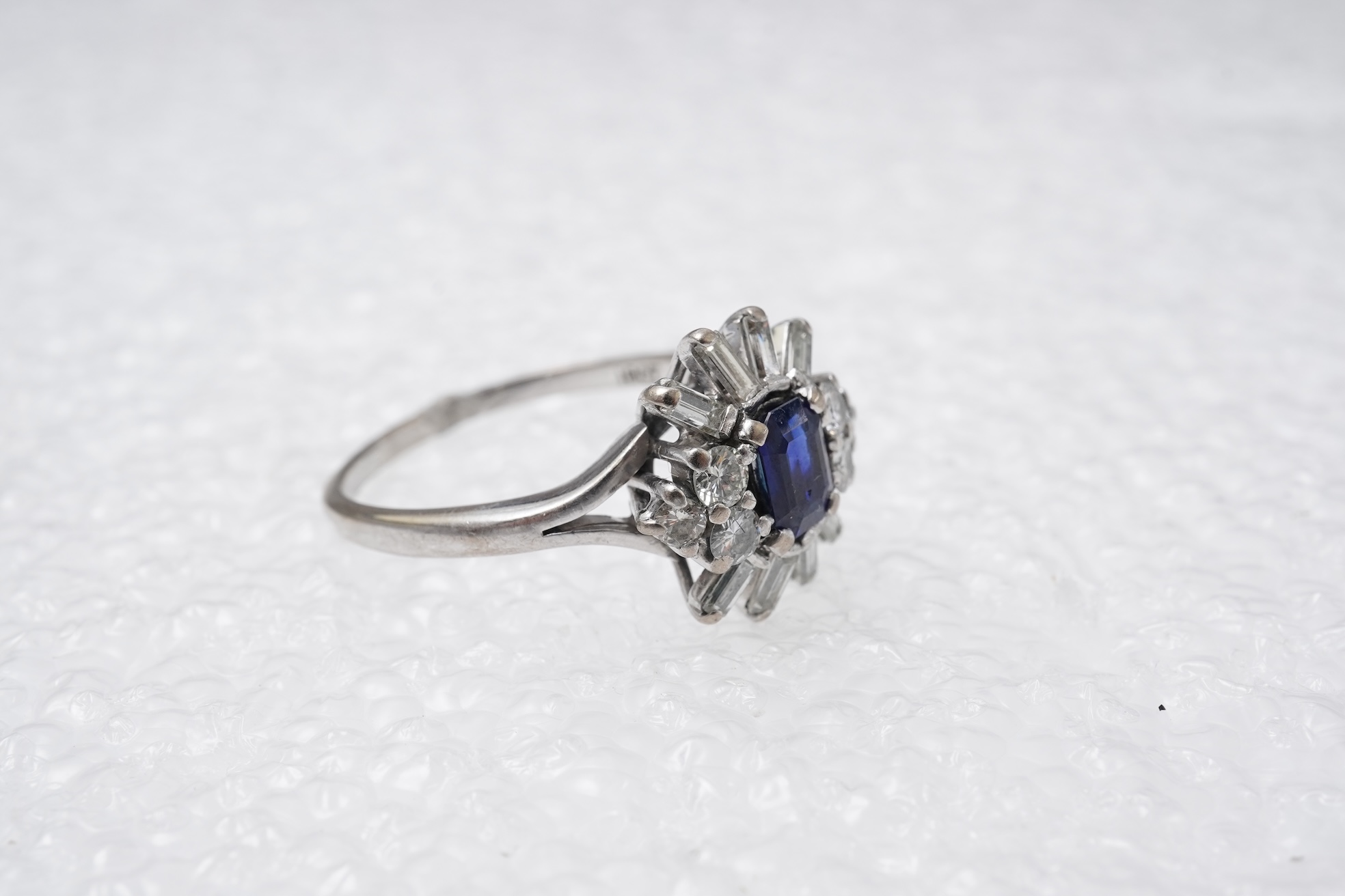 A sapphire and diamond ring, mid 20th century